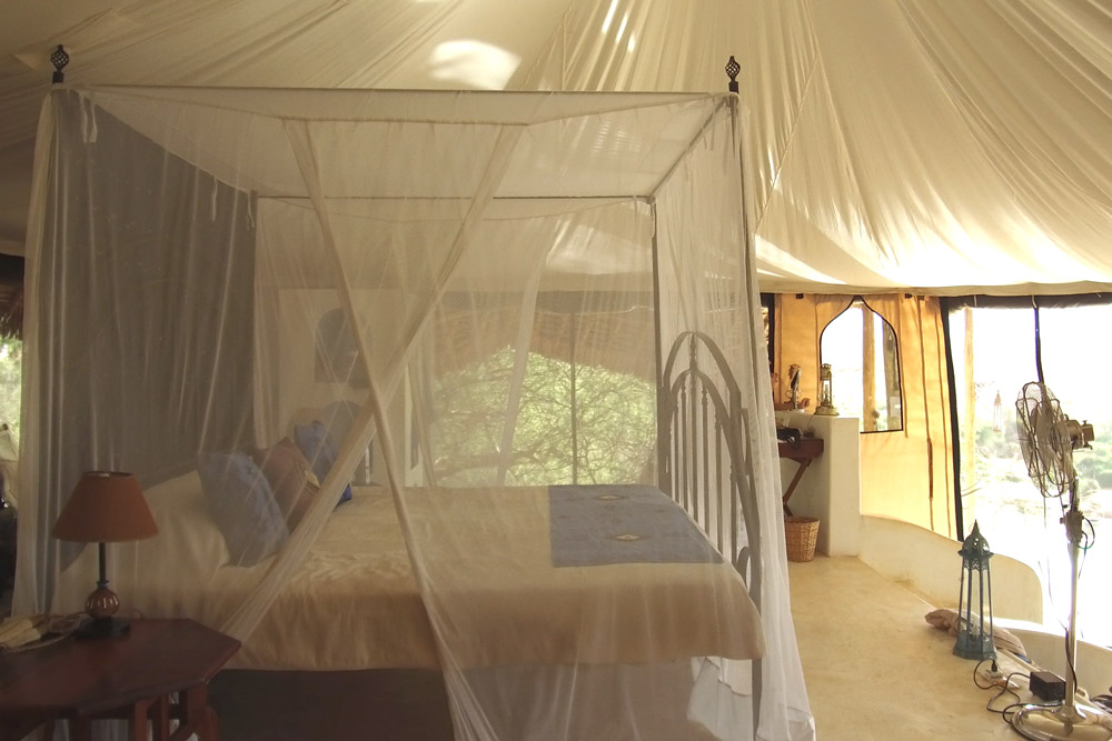 Our four poster bed at Sasaab - Scott Dubois
