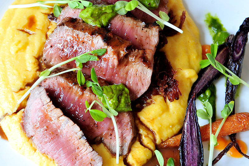 Lamb loin with lamb confit and carrot polenta at <i>Rouge</i> - © PWR Photography