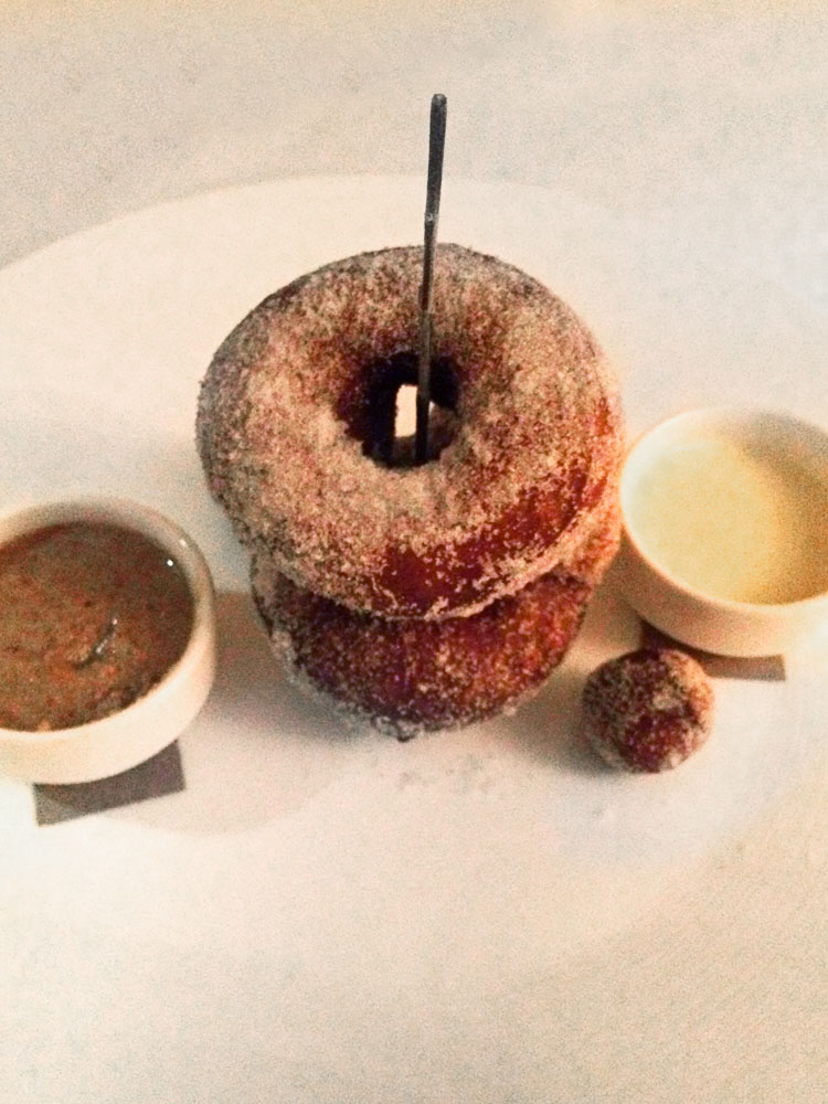 Brioche doughnuts with rosemary sugar, pineapple cream and almond butter in the restaurant at Topping Rose House in the Hamptons - Photo by Hideaway Report editor